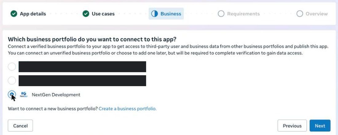 Business portfolio selection step of the Meta app wizard, with one portfolio selected and the other two blacked out, and a 'Create a business portfolio' link below